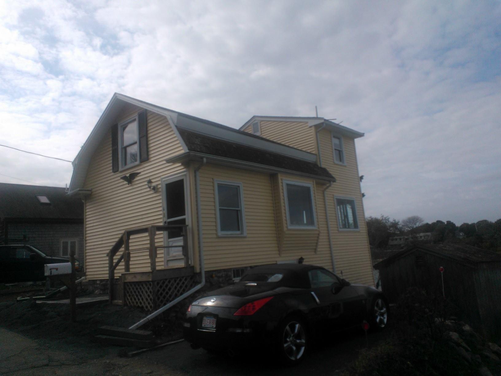Before photo of a smaller single-story home prior to second-story addition by Boston J's