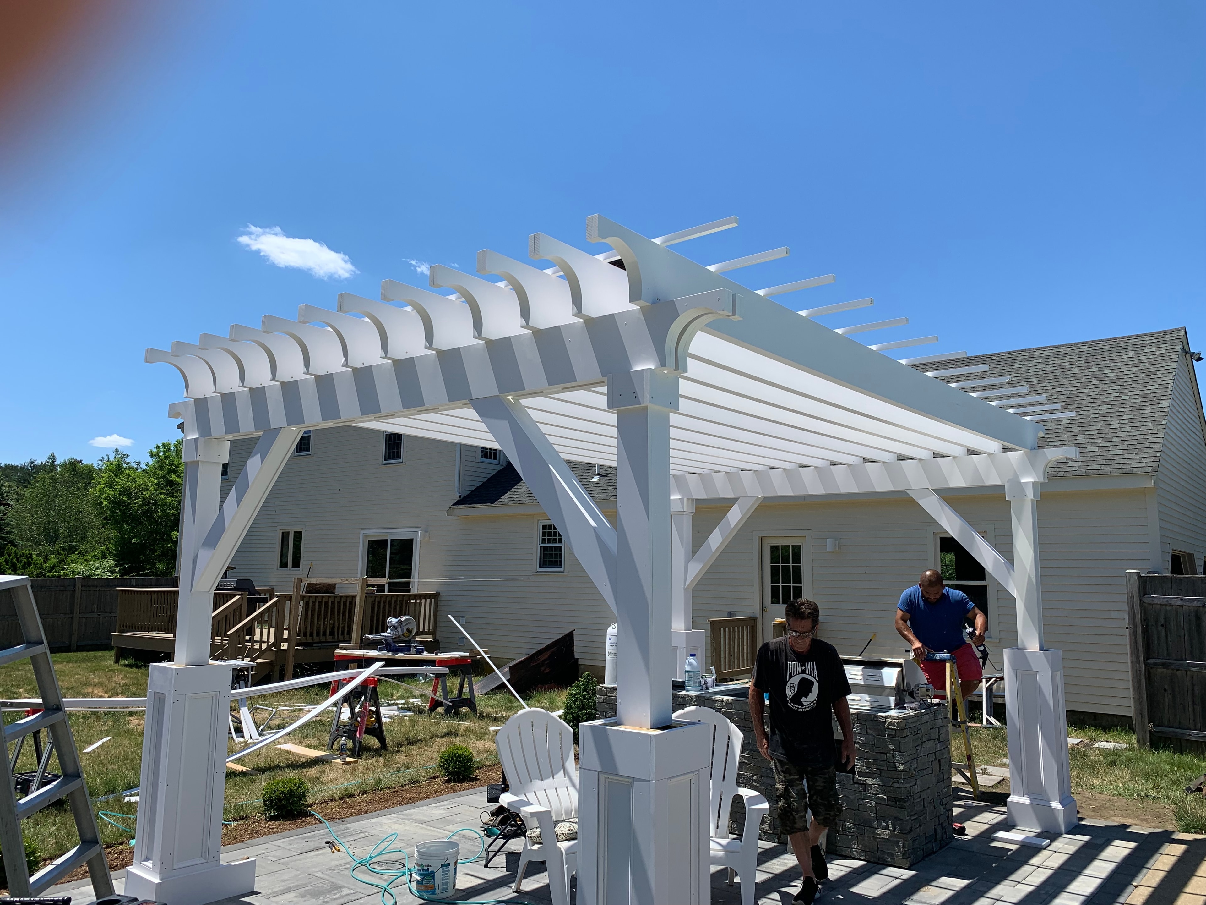 Boston J's crew constructing a pergola